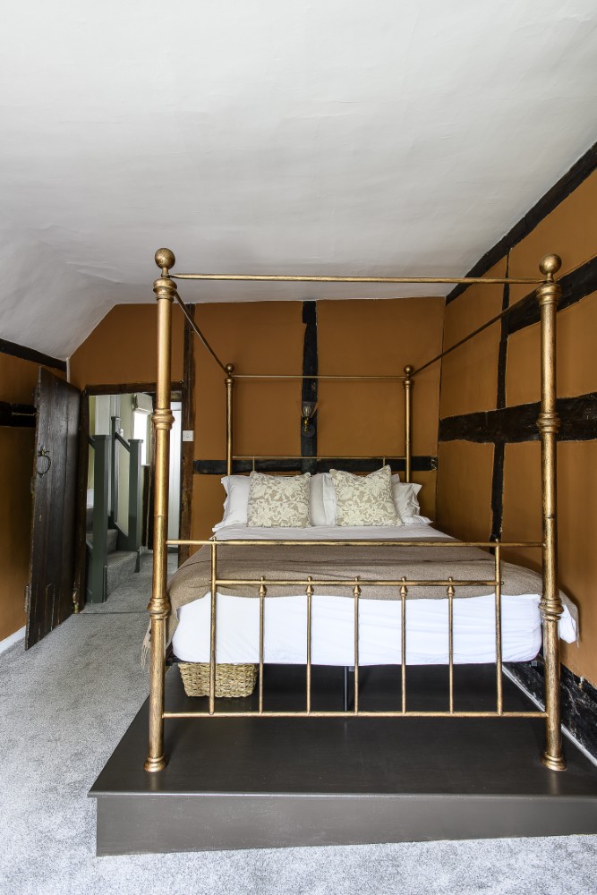 Preserving the house’s quirks (wonky floors and all) the four-poster bed in one of the rooms has been levelled with a platform, ensuring a comfy night’s sleep