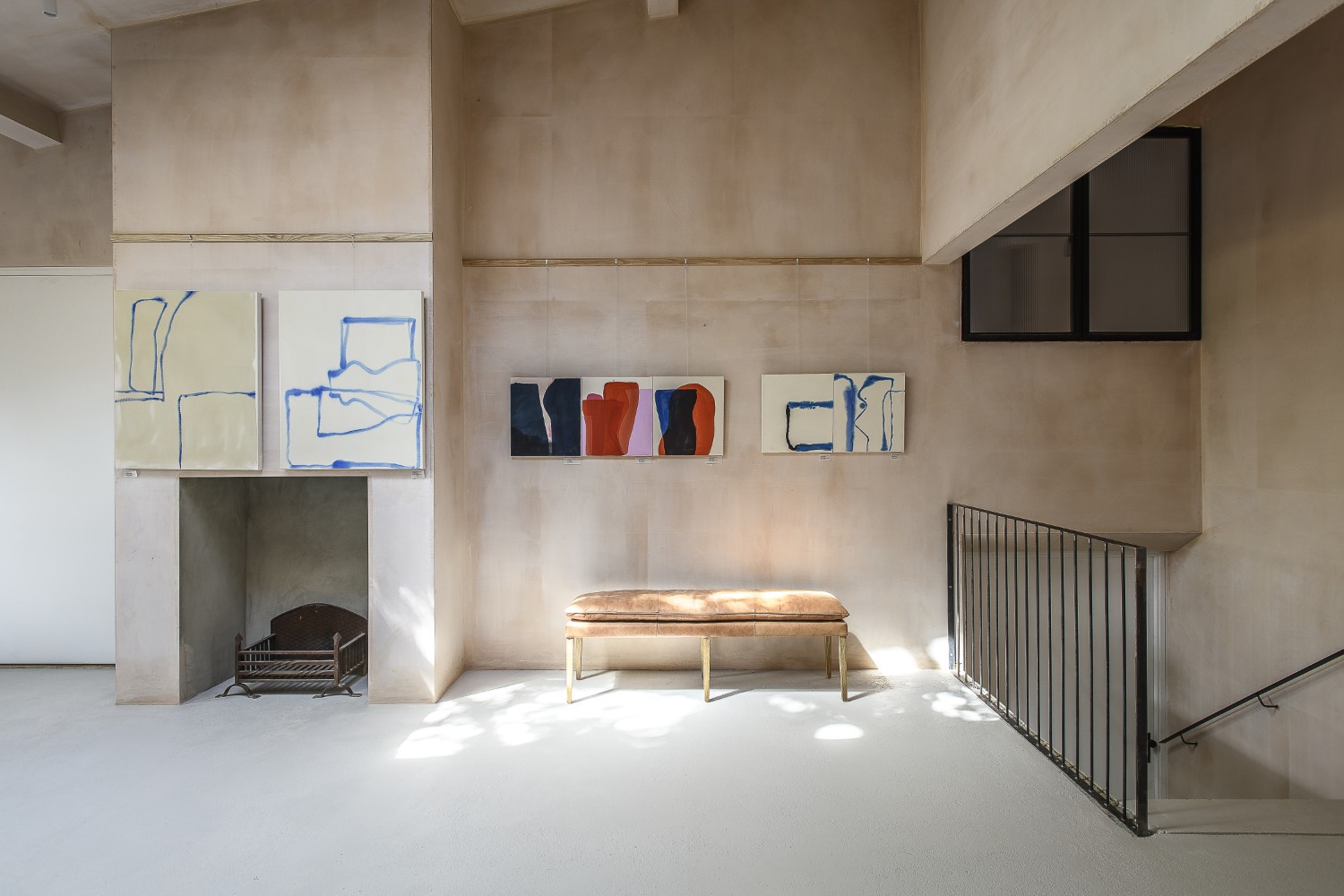 Large abstract pieces by Beth Shapeero hang next to landscapes by Ian Mowforth and figurative works by Kate Boxer.