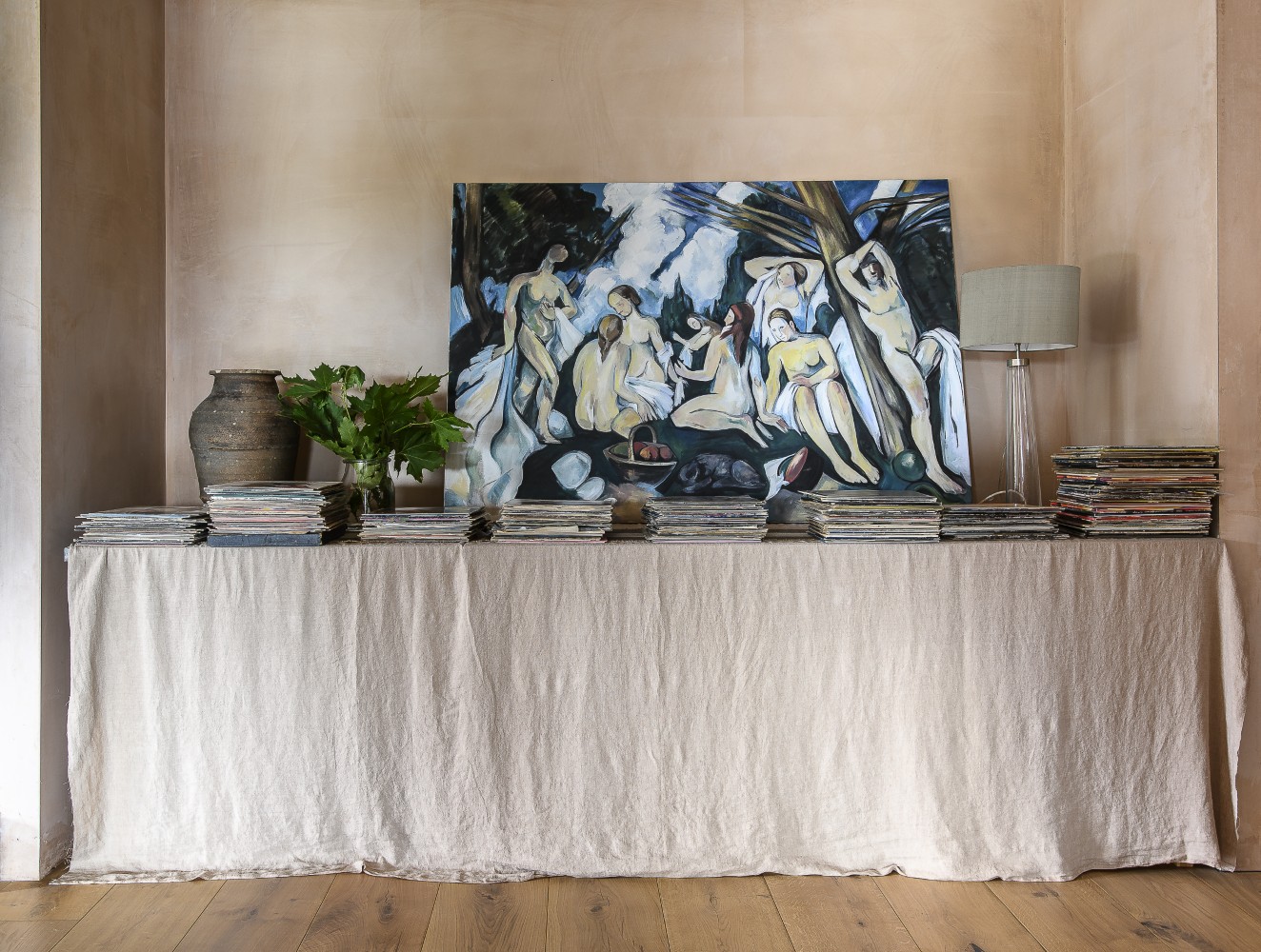 Books and records are treated as creative life essentials rather than styling props.