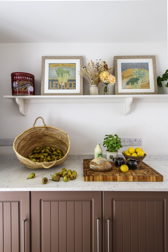 Houseplants and items from Sarah’s time in Italy, such as ornate tins, add a little extra character